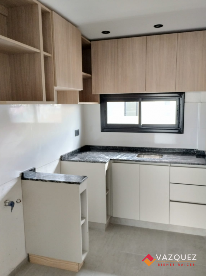 Departamento 2 ambientes con Cochera Descubierta B